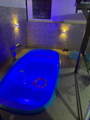 Sobrado com piscina no Santinho